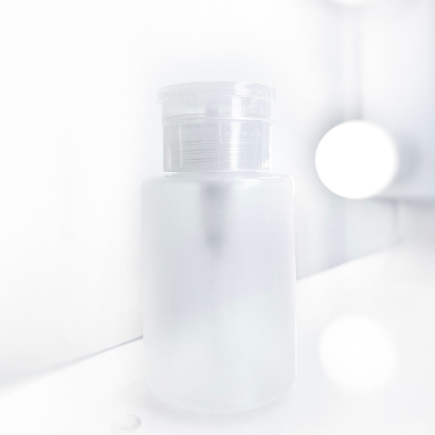 A bottle with a pump